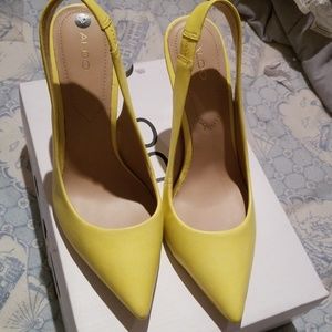 beautiful yellow open back pumps